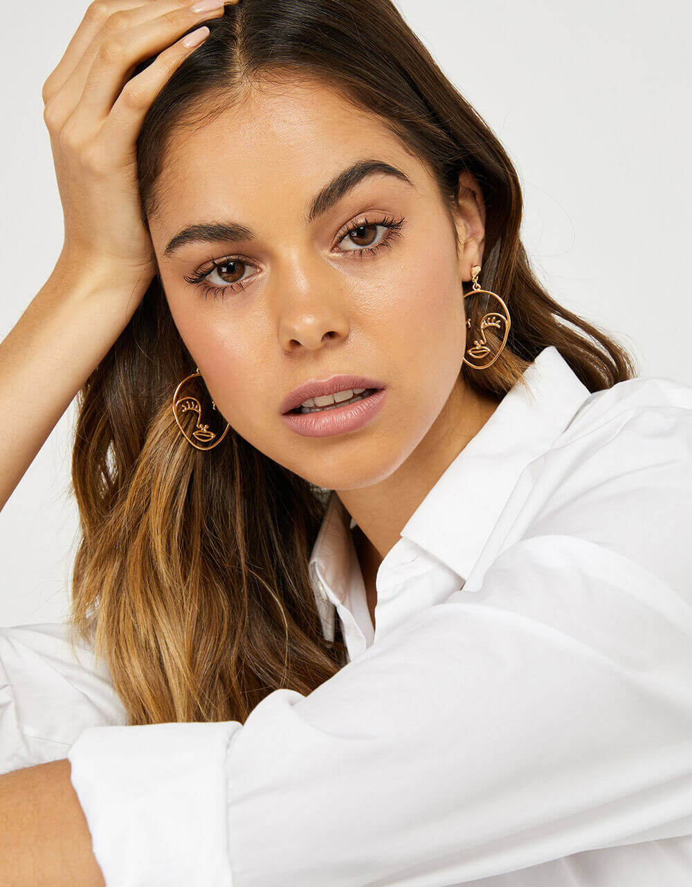 Accessorize Gold Face Earrings